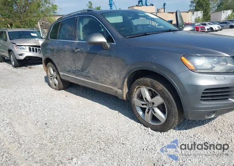 2013 Volkswagen Touareg Tdi Lux z USA, uszkodzony, nr VIN WVGEP9BP7DD005089